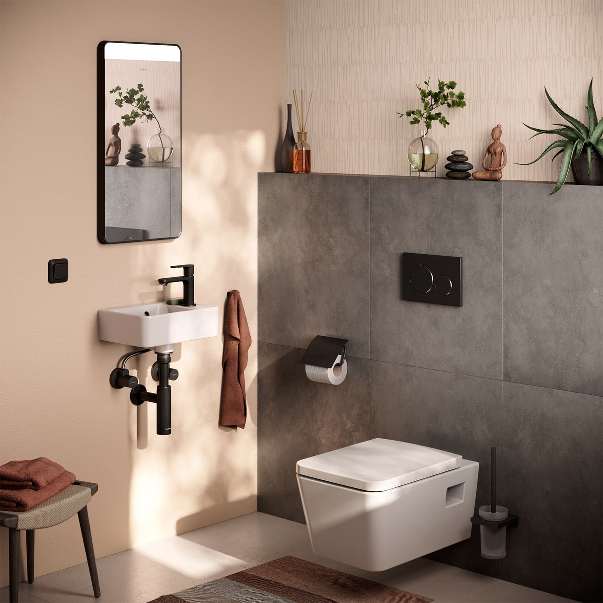 WC suspendu Grohe, blanc, salle de bain moderne avec détails noirs et lavabo compact.