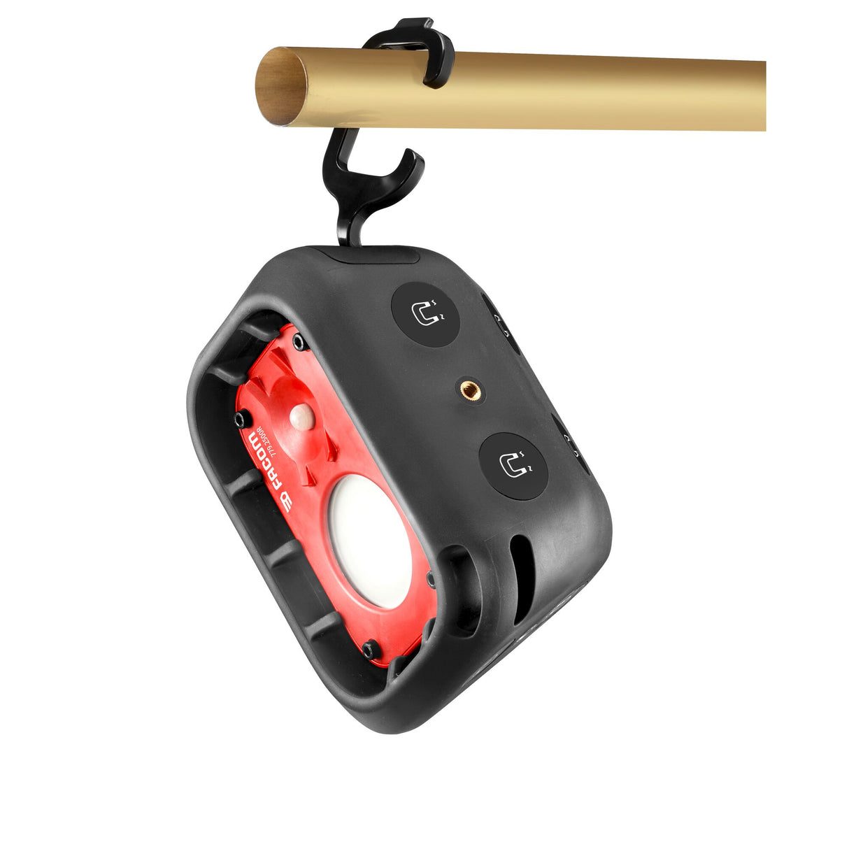 Lampe de chantier Facom, projecteur portable noir et rouge suspendu à une barre.