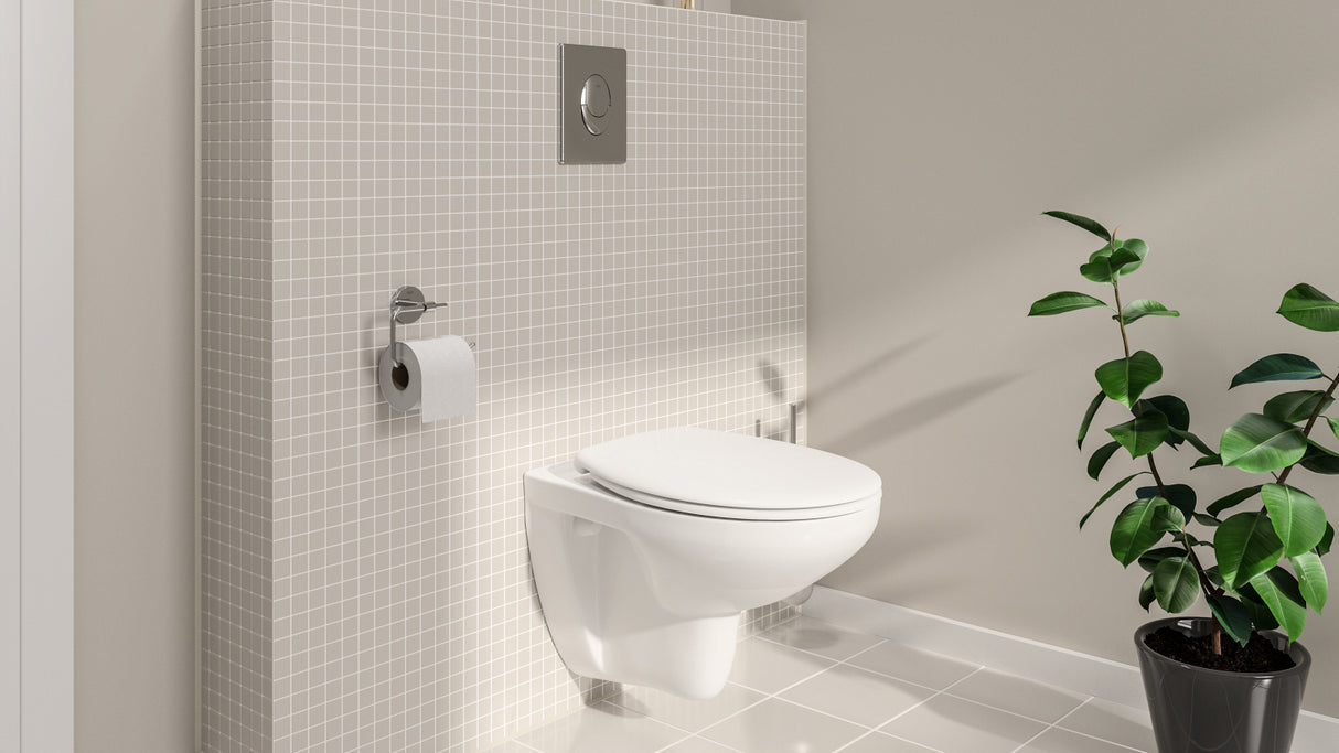 WC suspendu TOTO blanc, design moderne, installé sur mur carrelé avec plante décorative
