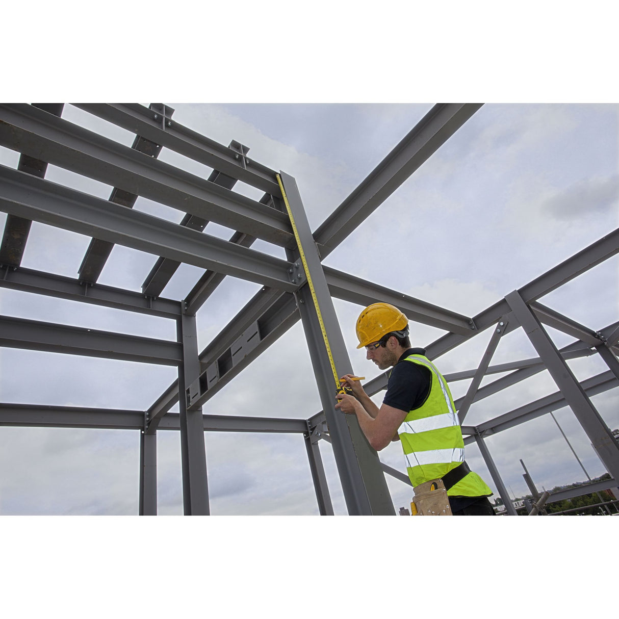 Stanley mètre ruban jaune, outil de mesure, utilisé sur chantier construction, couleur jaune