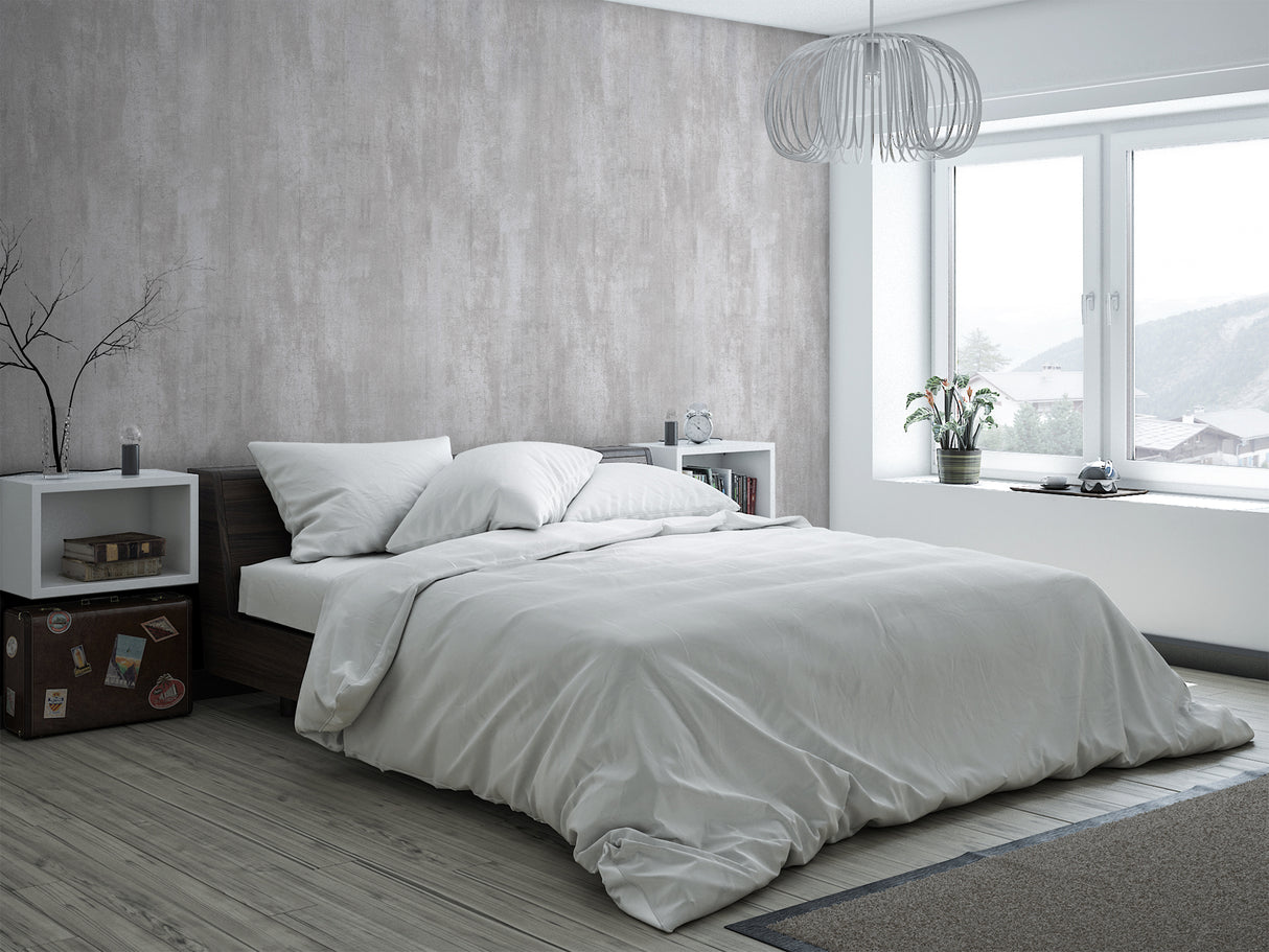 Panneau mural VIPANEL, type décoratif, couleur béton gris, posé dans une chambre moderne.