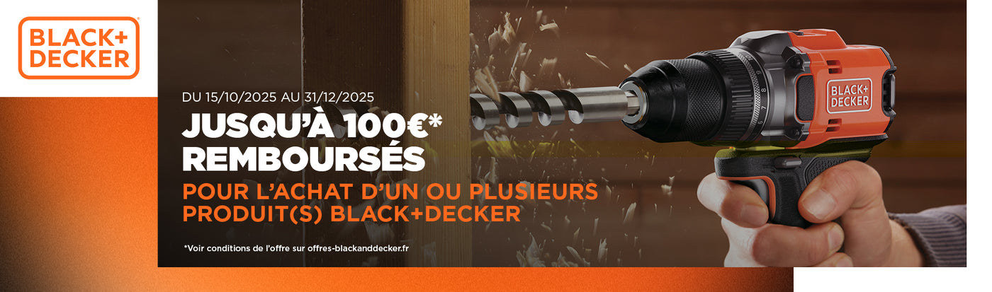 Perceuse électrique Black+Decker, outil électroportatif, couleur orange et noire, en usage.