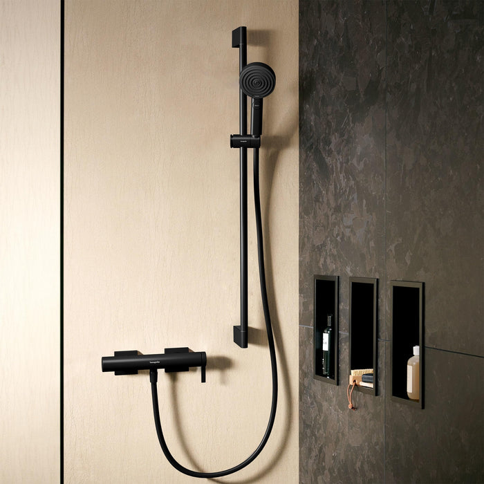 Douchette Hansgrohe, colonne de douche noire, mitigeur thermostatique élégant mural.