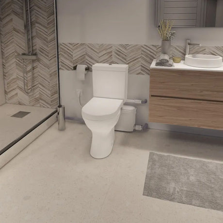 Broyeur Sanibest Pro SFA pour WC, adaptable, avec moteur puissant et système de broyage pour installations sanitaires.