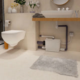 Broyeur WC Sanipack Pro Up Silencieux de SFA avec 3 entrées, pièce pour toilettes, design compact et silencieux.