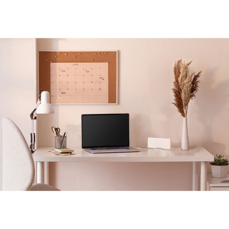Purificateur d'air blanc marque Rowenta, modèle compact, posé sur bureau moderne