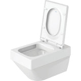 WC suspendu blanc Duravit avec abattant relevé, sanitaire moderne