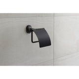 Porte-papier toilette Grohe noir mat fixé au mur sur carrelage clair