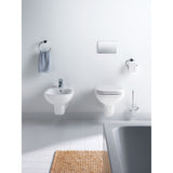 Plaque de commande Grohe, sanitaire, couleur chrome, installée sur mur blanc de salle de bain.