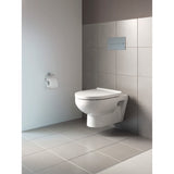 Toilette suspendue Grohe blanche, design moderne, installée sur mur carrelé gris.