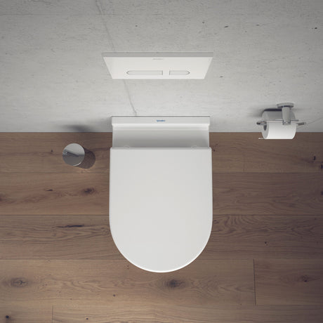WC suspendu blanc Duravit, abattant blanc, design moderne, sur sol bois