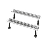 Paire de pieds réglables chromés pour baignoire, marque Grohe, finition métal argenté.