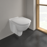 Toilette suspendue blanche de marque GROHE, design moderne, installée au mur.
