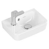 Lavabo blanc marque Villeroy & Boch avec robinet chrome, sanitaire moderne