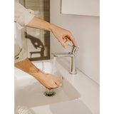 Mitigeur Grohe robinet de lavabo couleur chromé, design moderne, utilisé dans une salle de bain.