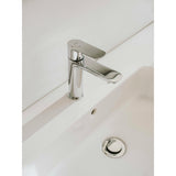 Mitigeur Grohe, robinet de lavabo, couleur chrome brillant, installé sur vasque blanche.
