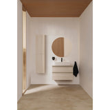 Meuble salle de bain Jacob Delafon, bois clair, avec lavabo blanc, design moderne.