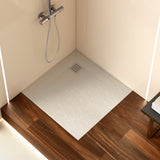 Receveur de douche extra-plat blanc de la marque Sanycces, texture pierre