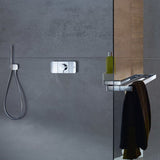 Mitigeur thermostatique Grohe, robinet de douche mural chromé, couleur argent.