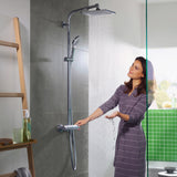 Douche Grohe, colonne de douche chromée avec pommeau et mitigeur, couleur argentée.