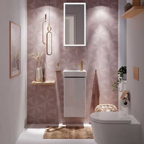 Meuble lave-mains Grohe doré pour toilettes, robinetterie couleur or, design moderne.