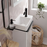 Lave-mains blanc Grohe, robinetterie noire, design moderne pour salle de bains.