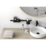 Distributeur de savon noir de marque Sonia, accessoire salle de bain moderne, couleur noire.