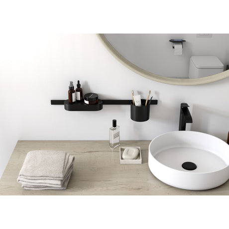Distributeur de savon noir de marque Sonia, accessoire salle de bain moderne, couleur noire.