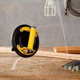 Ventouse Facom, outil de levage, couleur noire et jaune, sur plaque de verre