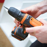 Perceuse visseuse sans fil BLACK+DECKER 12V avec 2 batteries 1,5Ah et 100 accessoires, outil électrique pour bricolage.