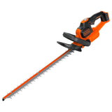 Taille-haie Black+Decker électrique, couleur orange et noir, outil de jardinage.