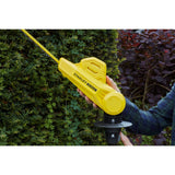 Taille-haie Stanley jaune, outil de jardinage électrique, utilisé pour tailler des haies