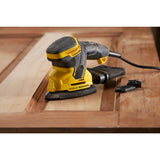 Ponceuse électrique Stanley jaune et noire, outil électroportatif pour bois.