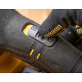 Bouton de réglage sur scie sauteuse DeWalt, outil électroportatif noir et jaune