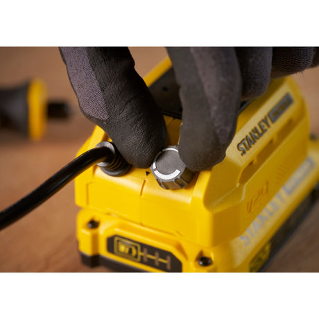 Ponçeuse électrique Stanley, jaune, bouton de réglage en gros plan