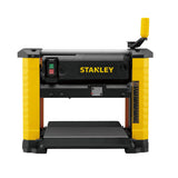 Dégauchisseuse Stanley jaune et noire, machine électrique pour menuiserie.