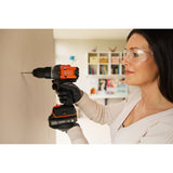 Perceuse visseuse à percussion BLACK+DECKER 18V brushless, éco-responsable, sans batterie, outil électrique pour bricolage.