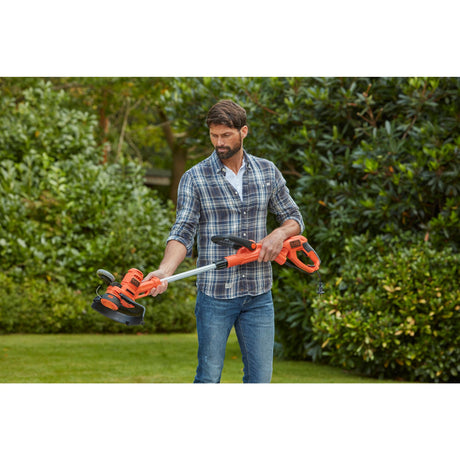 Coupe-bordure électrique filaire BLACK+DECKER 550W avec largeur de coupe de 30 cm et rallonge de 10 m, modèle BESTA530C10-QS.