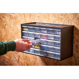 Organisateur de rangement Facom, type casier à tiroirs, couleur noir, fixé au mur