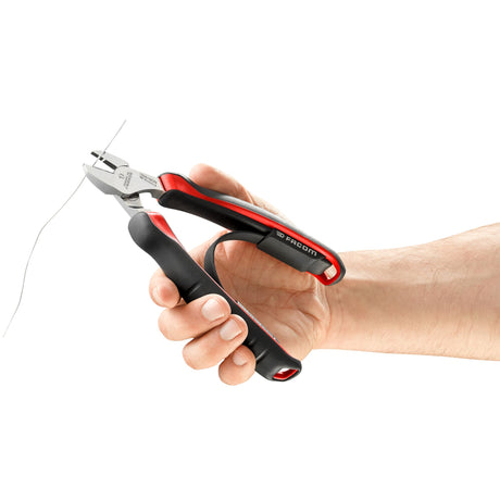 Pince coupante Facom, outil noir et rouge, utilisée pour couper un fil métallique.