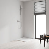 Receveur de douche blanc marque Roca, design rectangulaire, installé dans une salle de bain moderne
