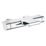 Mitigeur thermostatique Grohe chromé, robinet mural moderne pour salle de bain, couleur argentée.