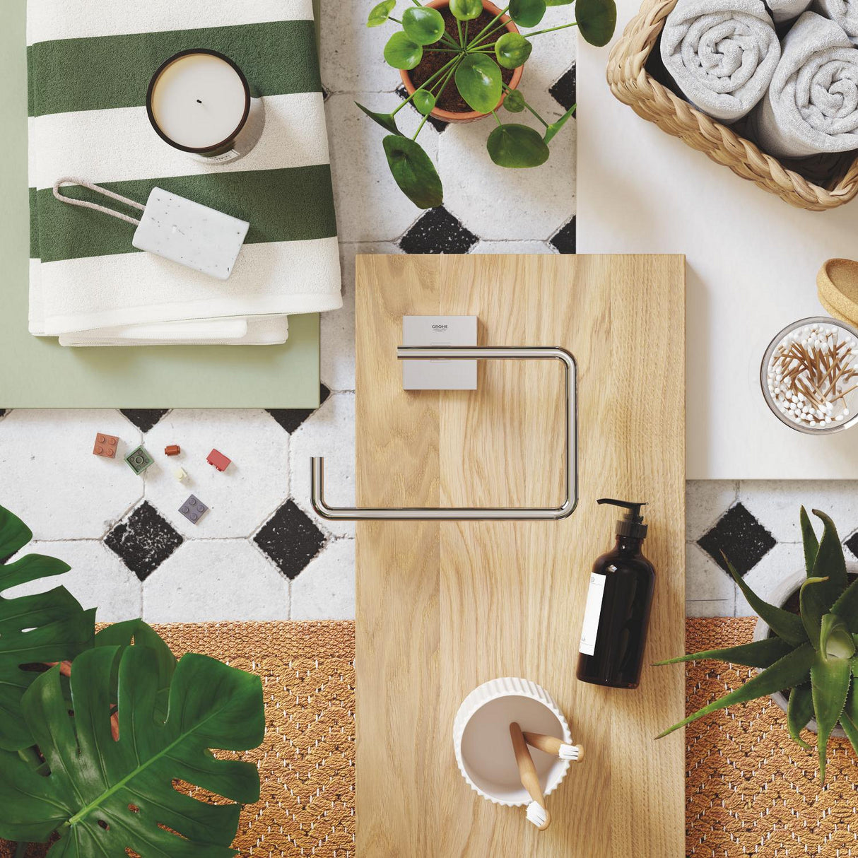 Porte-serviettes Grohe, accessoire salle de bain, inox argenté, posé sur bois clair.