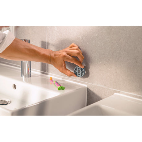 Support mural Grohe, accessoire salle de bain gris, installation facile sur carrelage.
