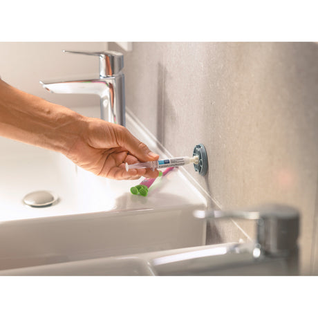 Support mural Hansgrohe gris pour salle de bain, fixation sanitaire moderne.