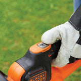Taille-haie Black+Decker, outil de jardin orange et noir, bouton Powercommand visible