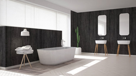 Salle de bain moderne avec panneau mural Vipanel, type décoratif, couleur pierre noire, ambiance élégante.