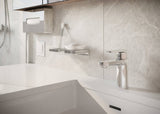 Mitigeur de lavabo Hansgrohe, type robinet, couleur chromé, installé sur vasque moderne