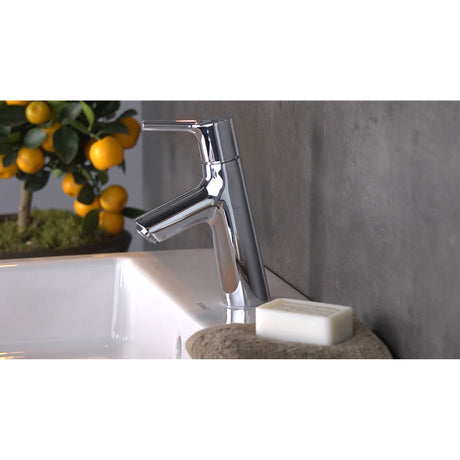 Mitigeur de lavabo Grohe, robinet chrome brillant sur vasque blanche