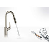 Mitigeur de cuisine Grohe couleur inox, robinet design avec accessoires de cuisine argentés